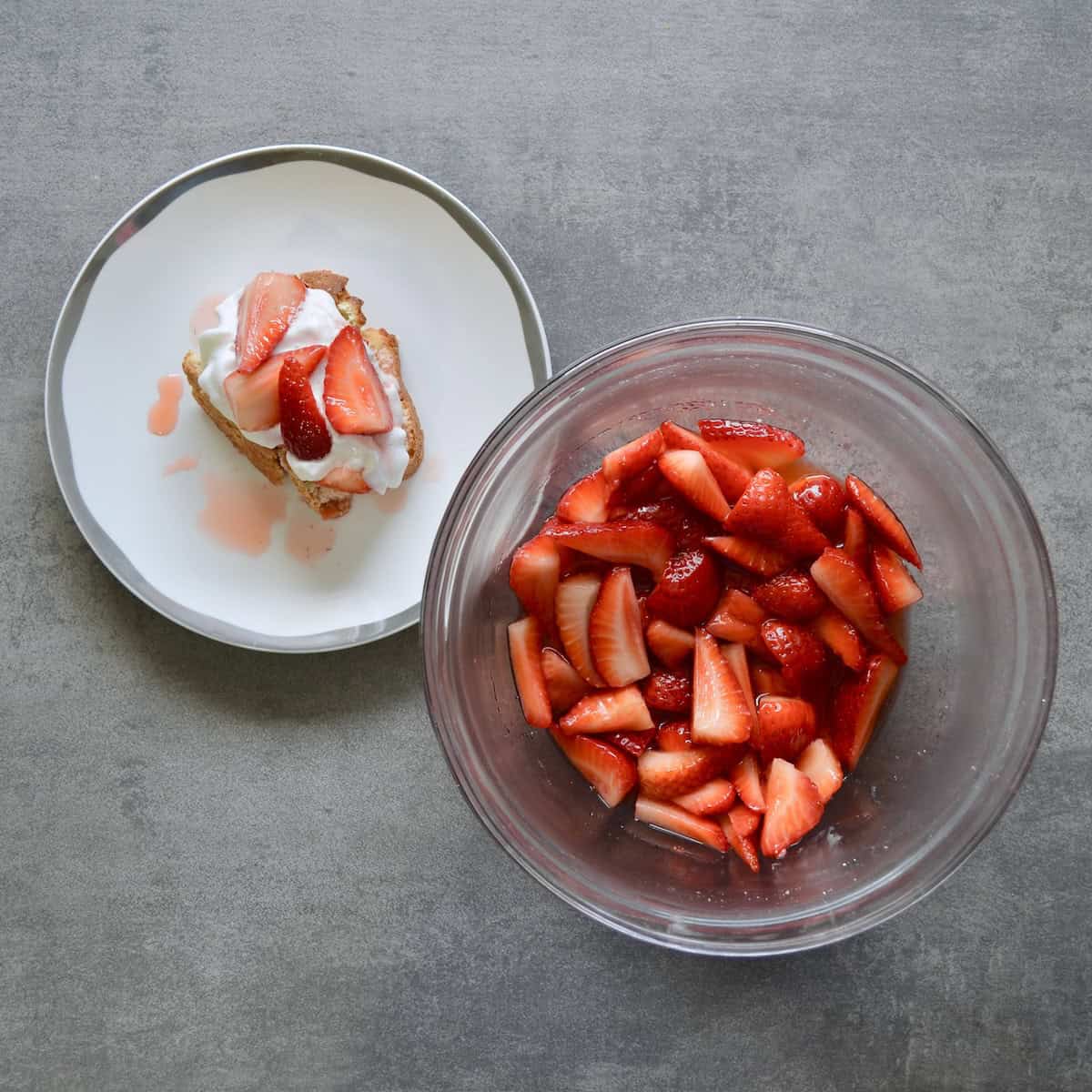 Plated shortcake and bowl of macerated strawberries