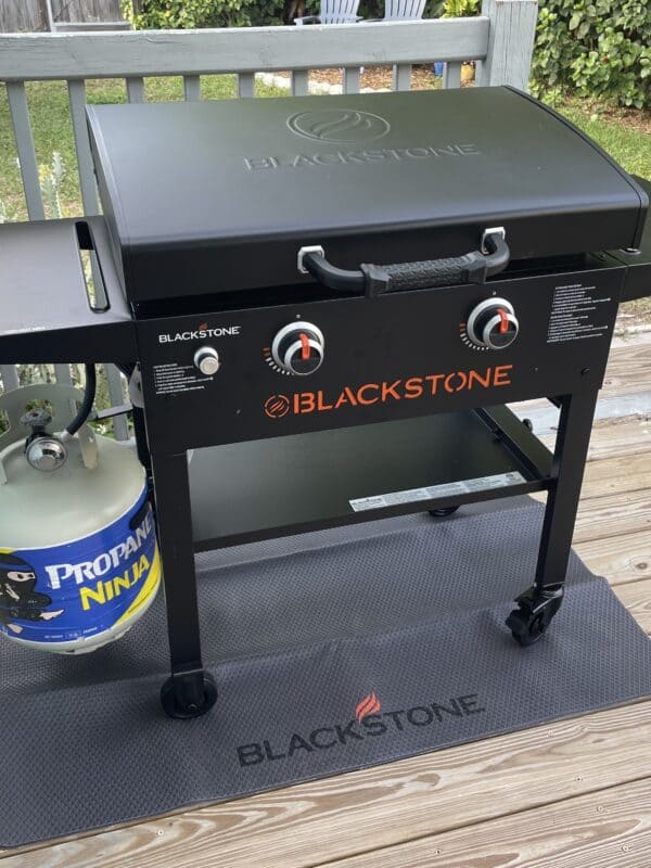 blackstone griddle on patio on mat