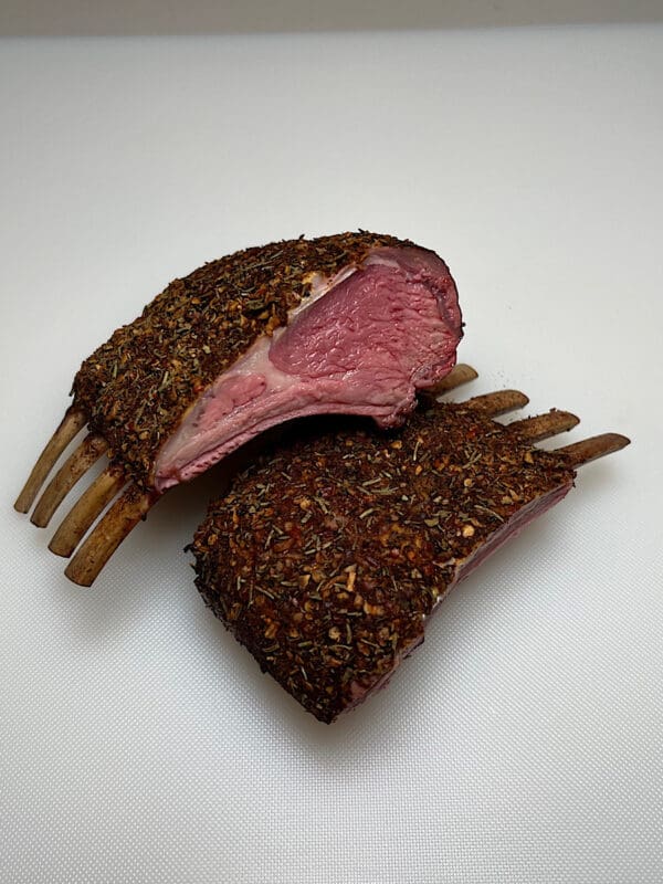 finished rack of lamb sliced in half