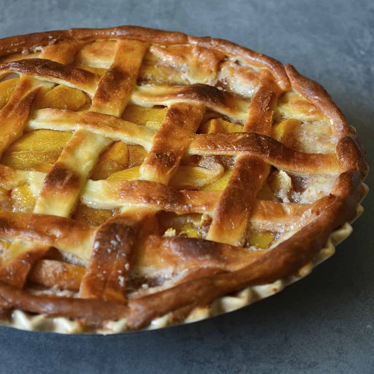 Close up of baked peach pie