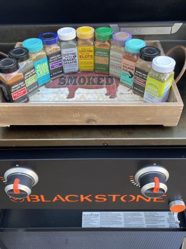 assortment of trader joes's seasoning on a blackstone griddle
