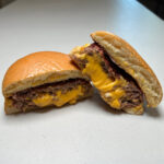 Juicy lucy burger on white counter