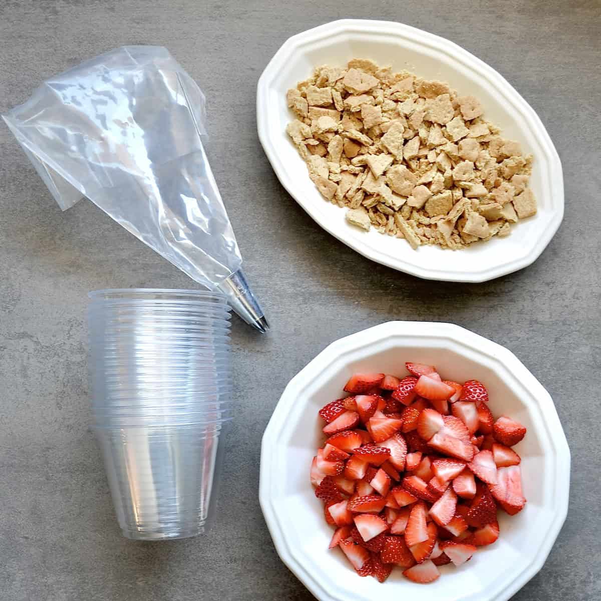 Strawberries and graham cracker pieces