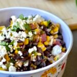 Black bean and corn salad with cheese on top