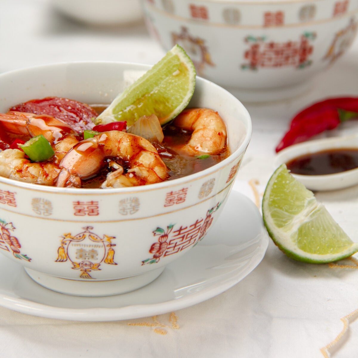 clear Thai tom yum soup with shrimp and lemongrass