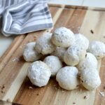 Snowball cookies on a cutting board
