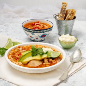Hearty and delicious Buffalo Chicken Chili with avocado topping.
