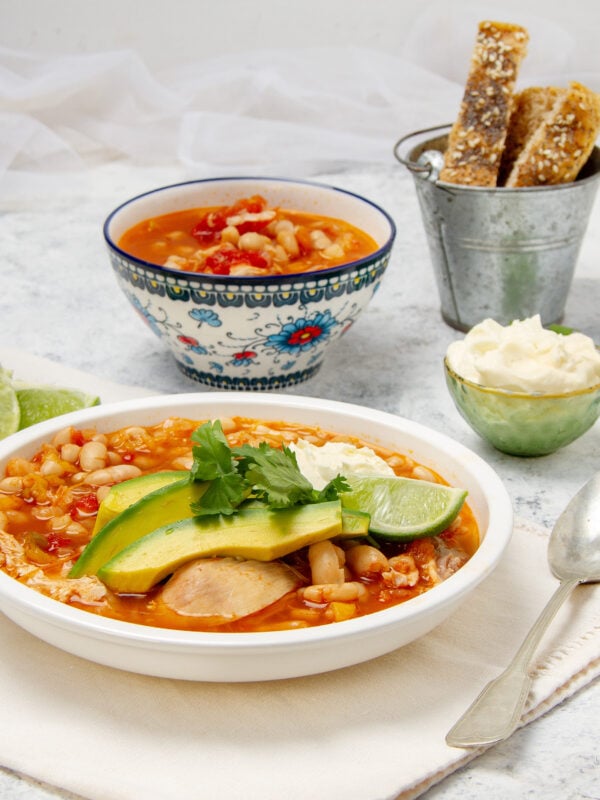 Hearty and delicious Buffalo Chicken Chili with avocado topping.