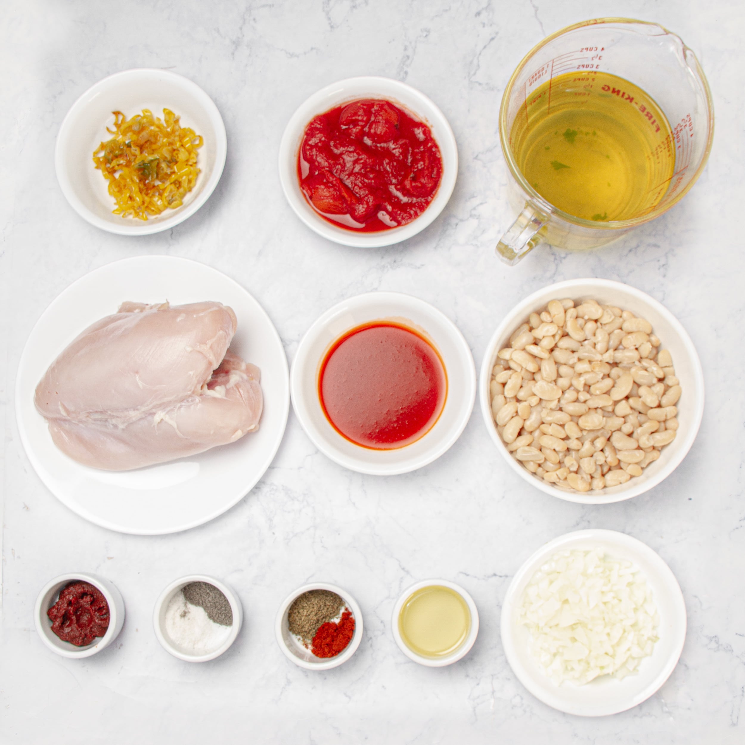 Buffalo Chicken Chili ingredients in separate dishes. 