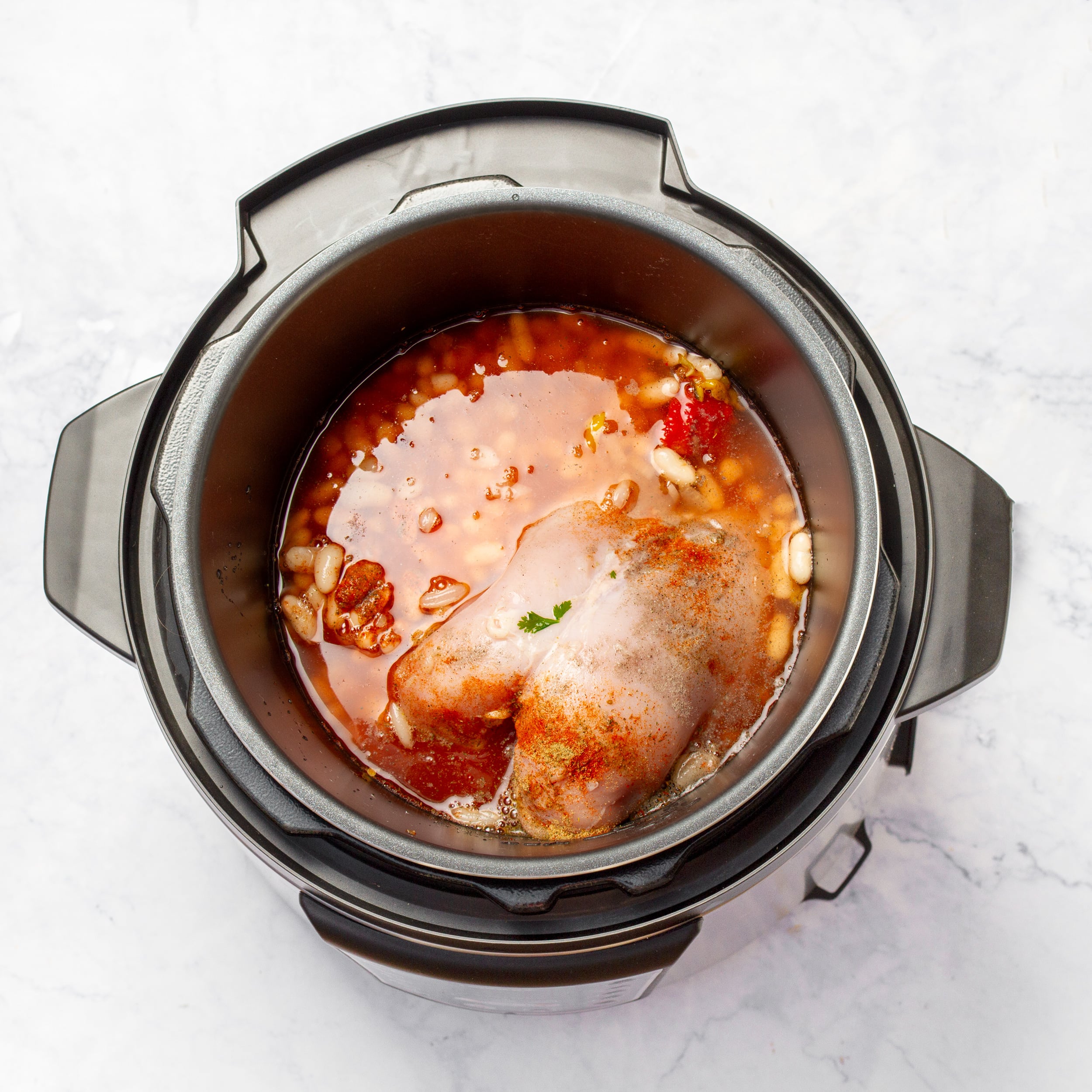 Add all chili ingredients in to the Instant Pot basin. 