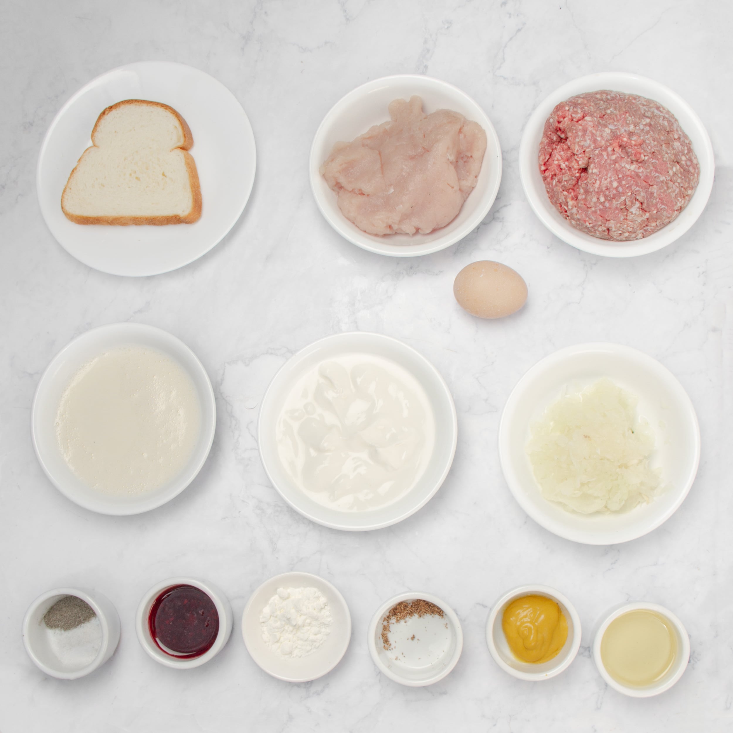 Swedish Meatball ingredients in separate dishes. 