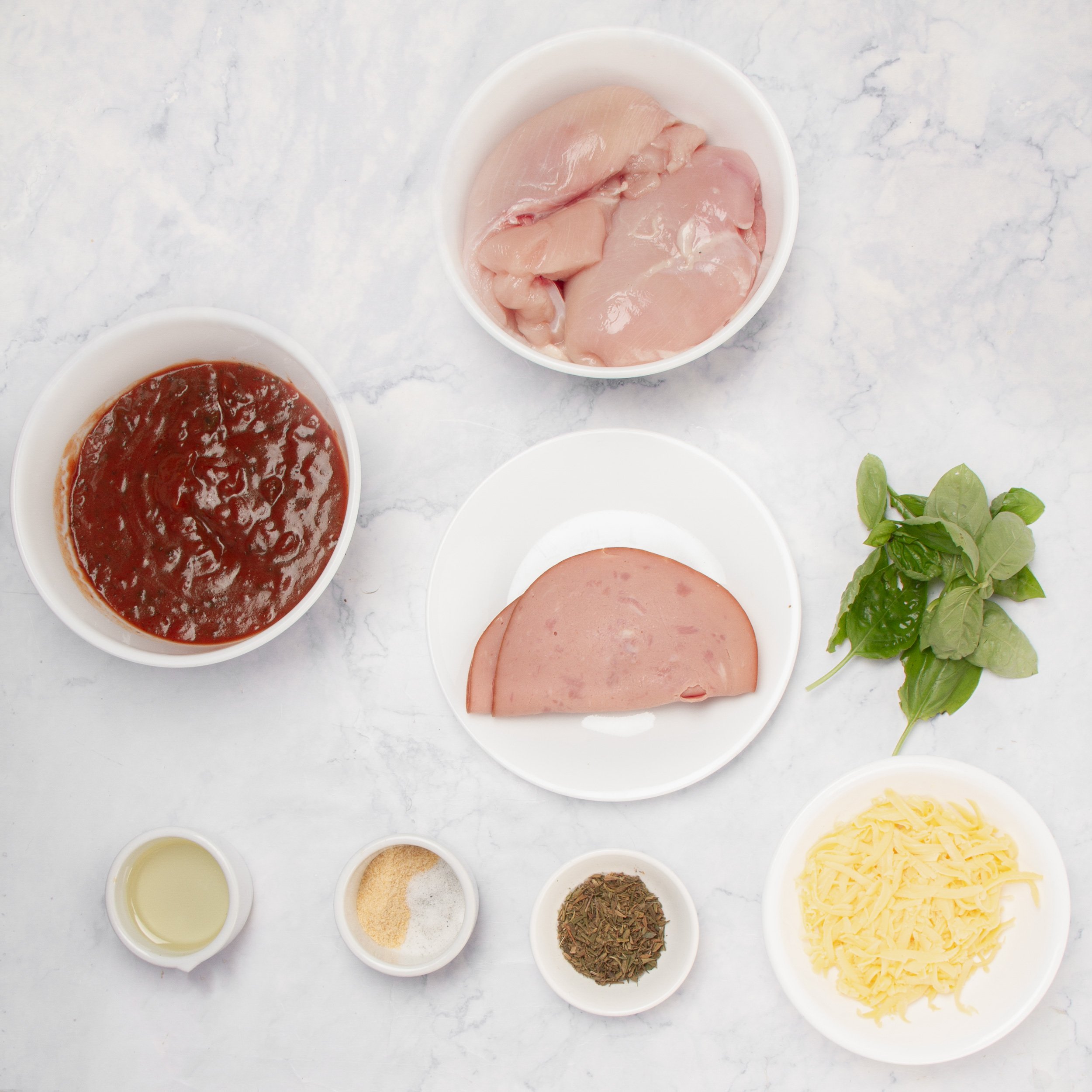 Chicken Rollatini ingredients in separate dishes.