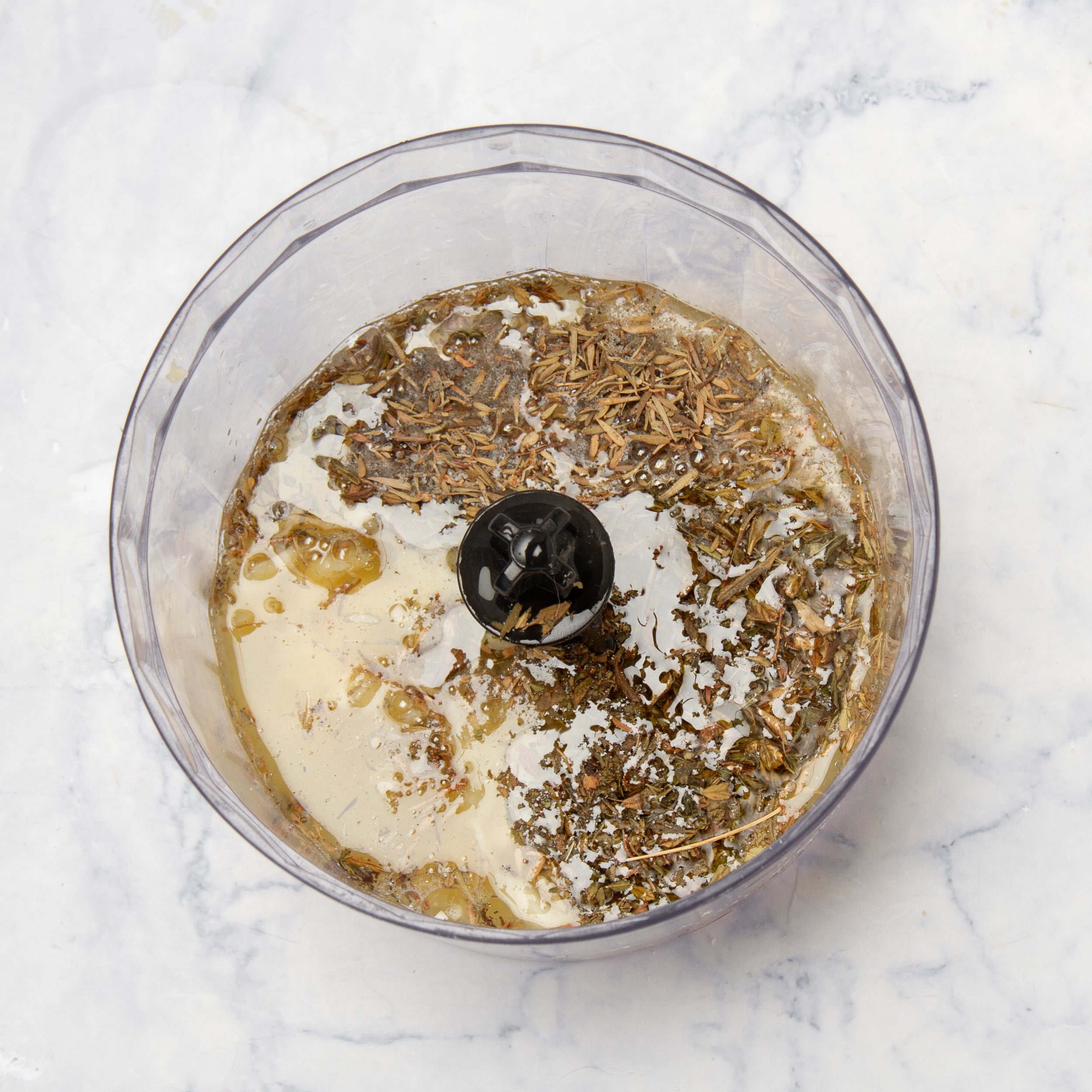 Marinade ingredients combined in a food processor. 