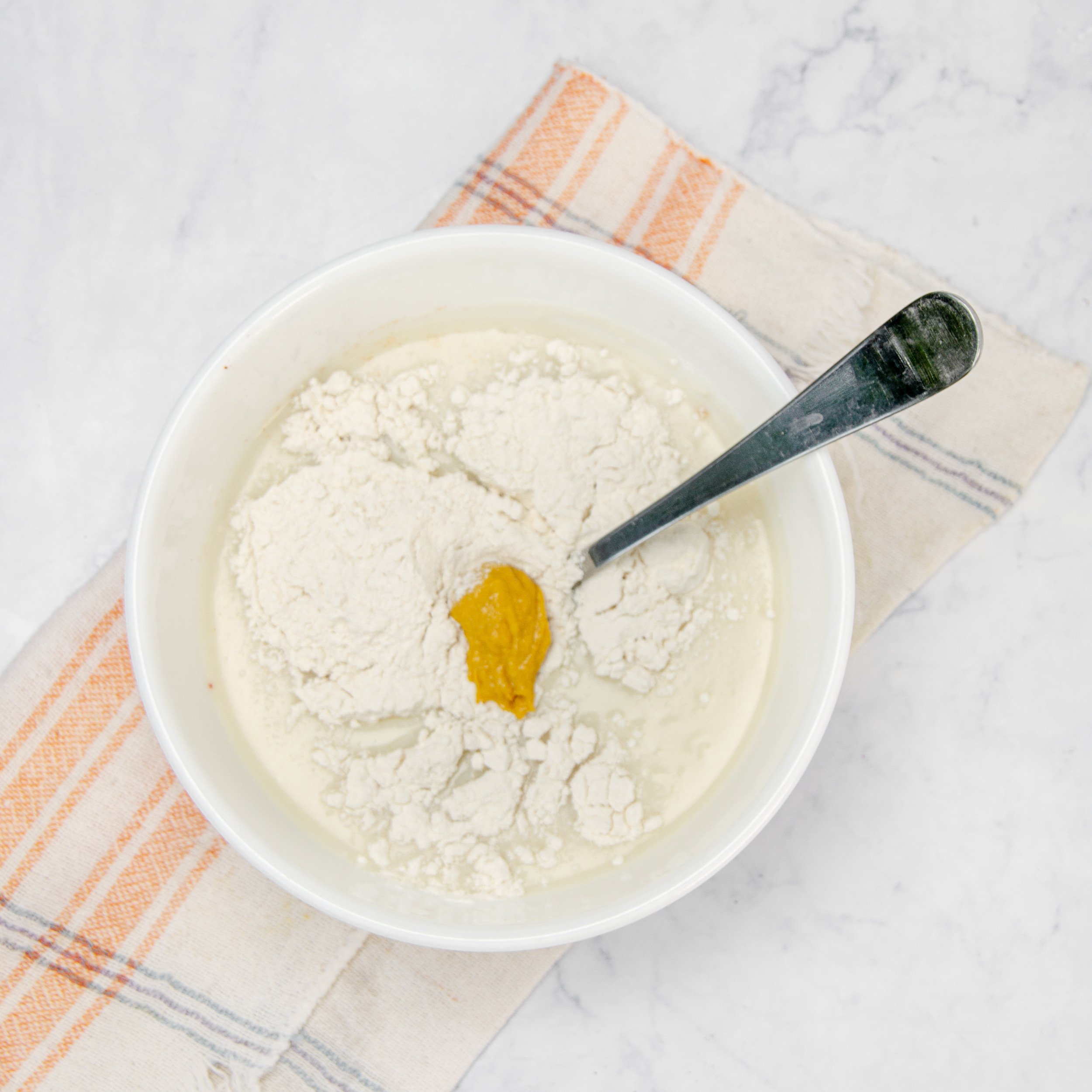 Ingredients for the creamy base mixed in a small bowl—mise en place!