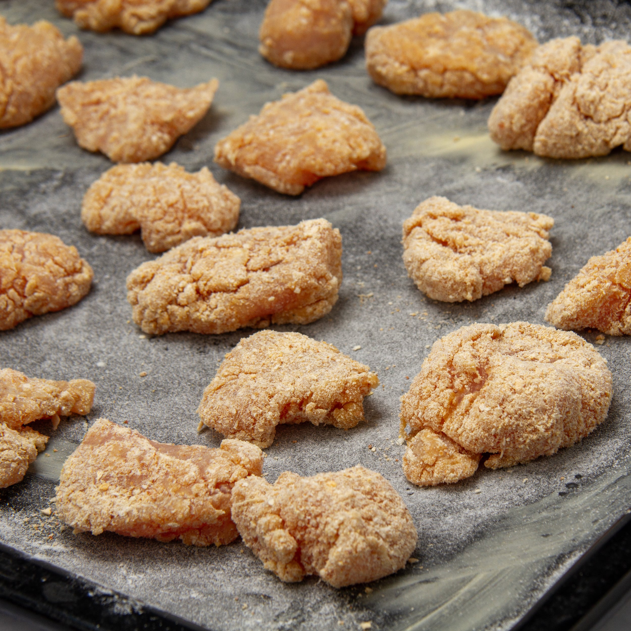 Breaded chicken baked to crispy perfection on a sheet pan. 