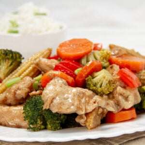 Fresh and healthy Chicken Stir Fry with vegetables on a plate.