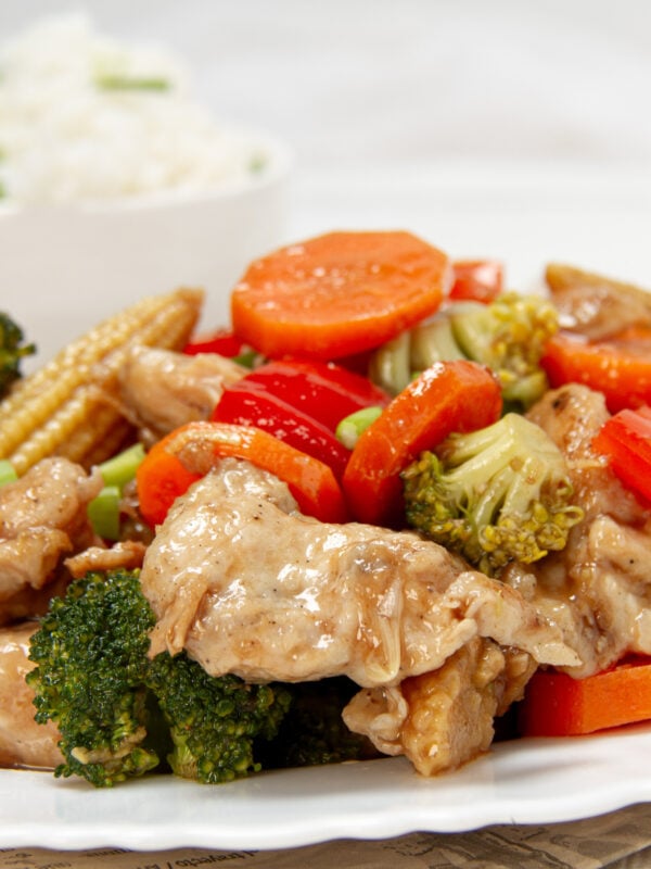 Fresh and healthy Chicken Stir Fry with vegetables on a plate.