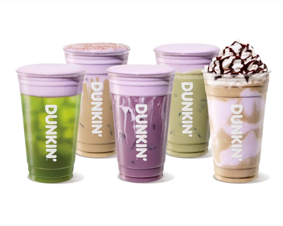 Five Dunkin' Halloween drinks topped with Purple Marshmallow Cold Foam: Sour Apple Energy, Terror-misu Cloud Latte, Dark Spell Daydream Refresher, Franki Matcha and the Creepy Crawler Coffee Chiller with whipped cream and mocha drizzle